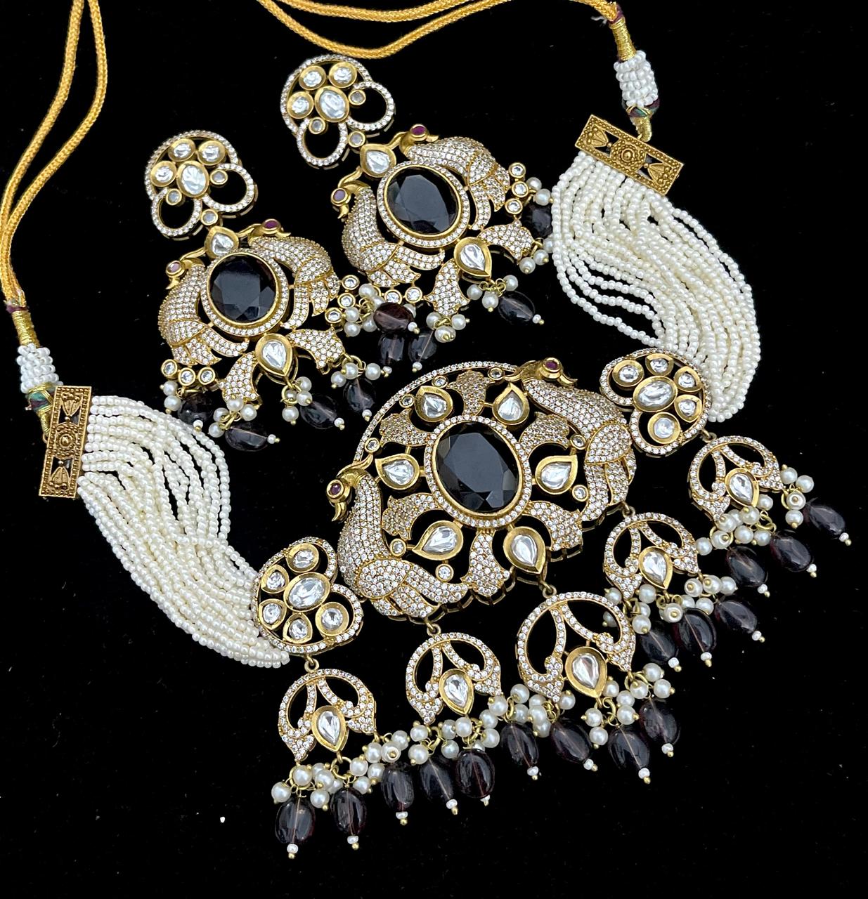 A premium quality celebrity look mozonite. Stonework necklace with beautiful earrings
